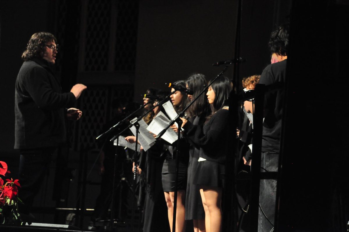 Mr. Van Wagner Directing the Choir