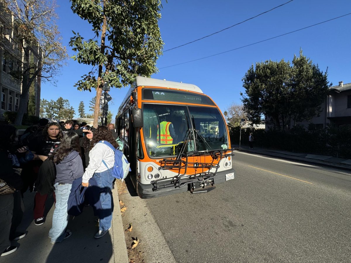 Passengers disembarking at the Saint George/Tracy bus stop.