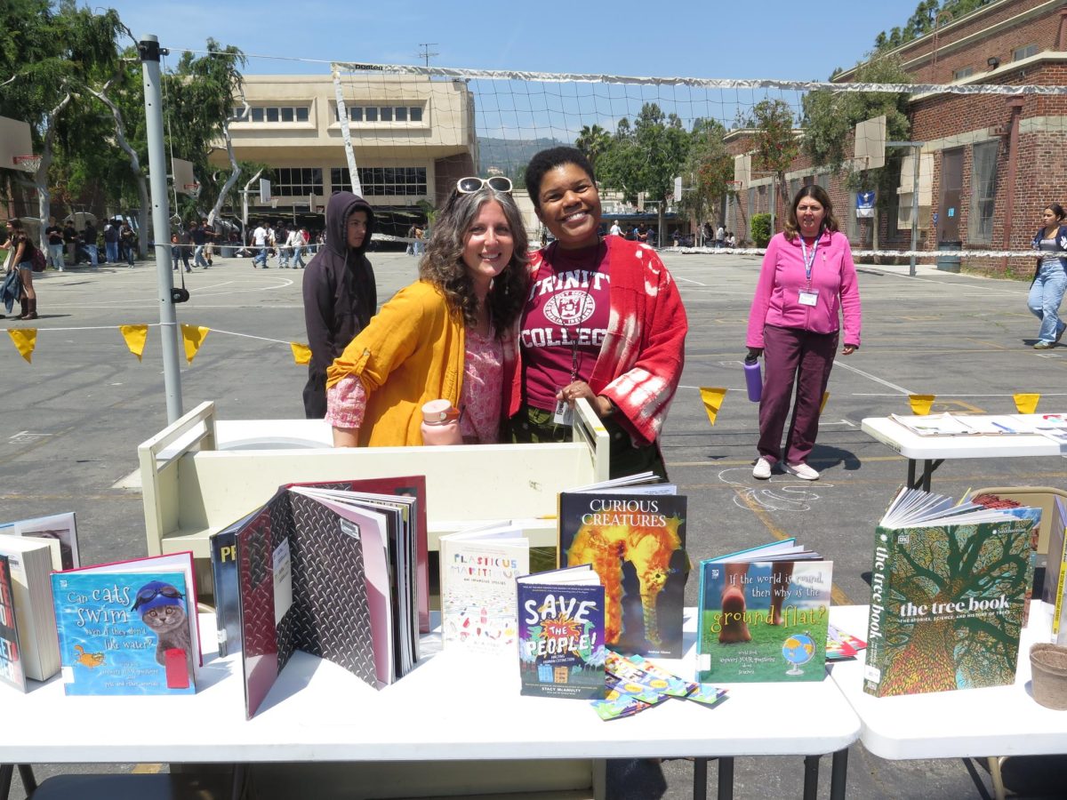 Ms. Berenfeld and Ms. Lemus participating in Earth Day activity.